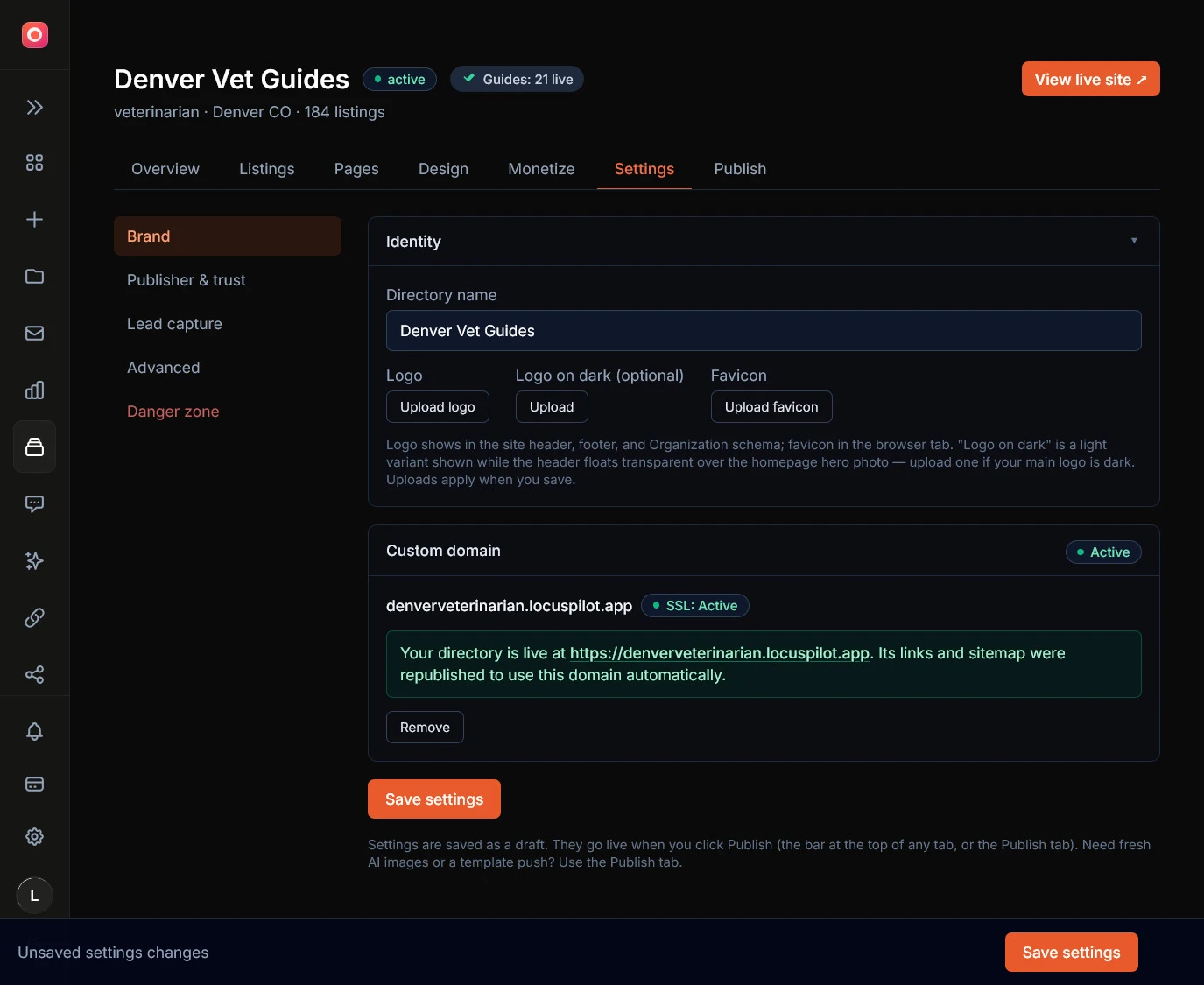 The Settings tab showing the editable directory name, publisher and trust fields, and the custom domain panel